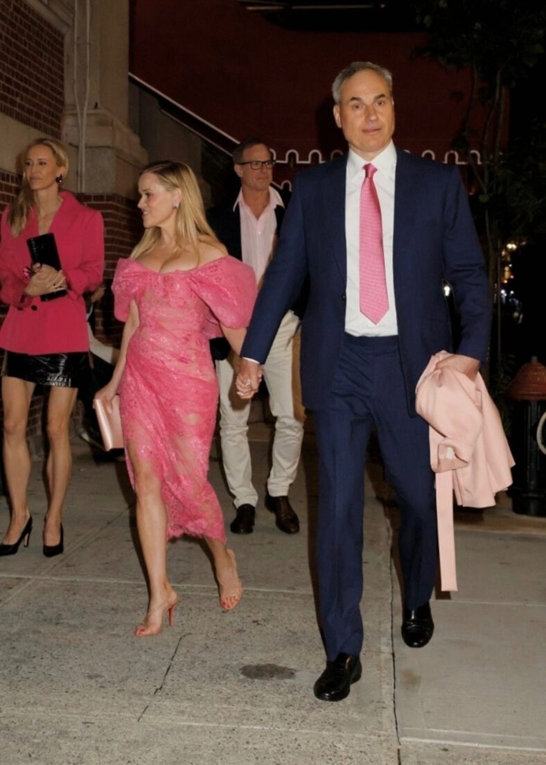 Reese Witherspoon holding hands with her boyfriend Oliver Haarmann
