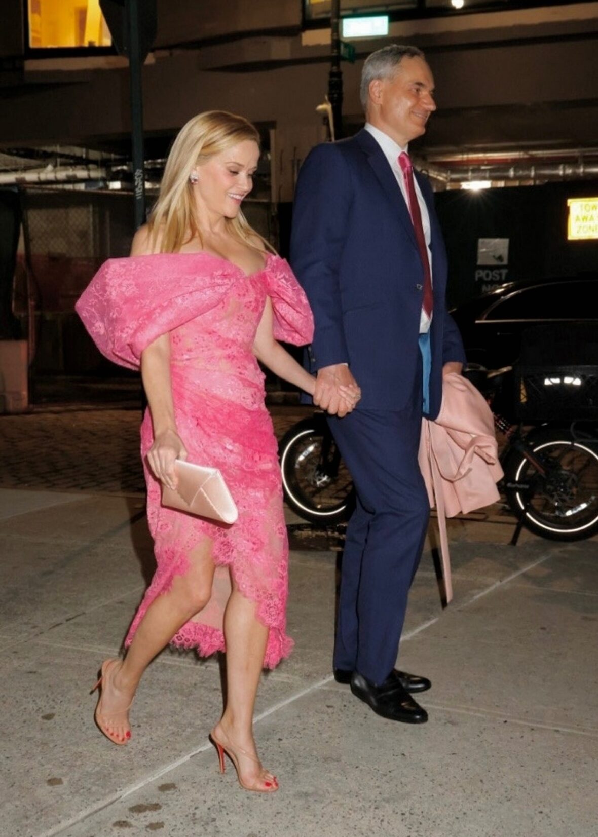 Reese Witherspoon holding hands with her boyfriend Oliver Haarmann