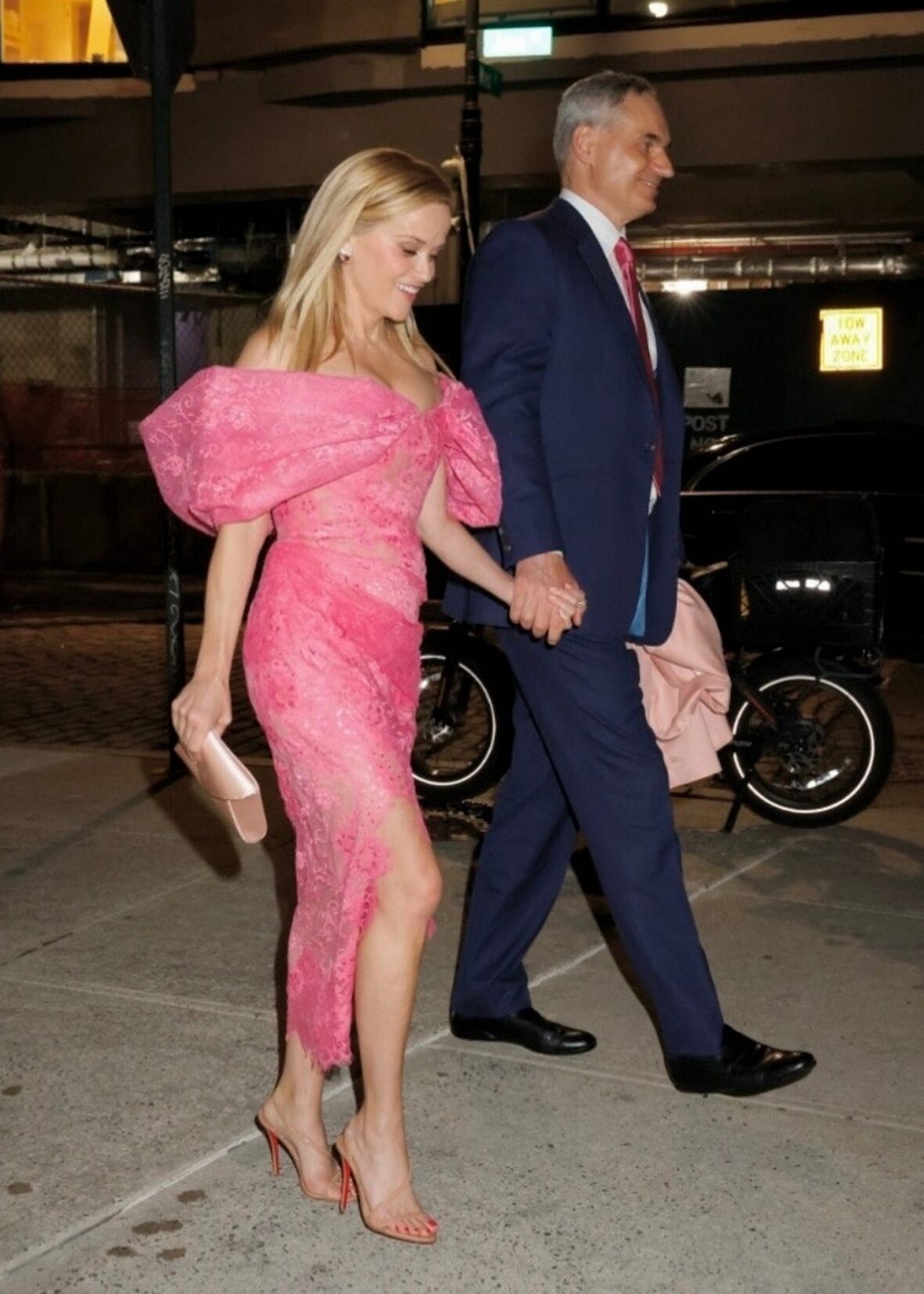 Reese Witherspoon holding hands with her boyfriend Oliver Haarmann