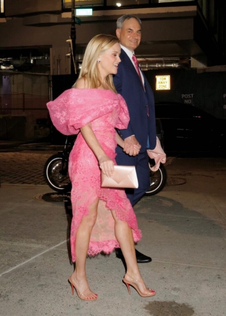 Reese Witherspoon holding hands with her boyfriend Oliver Haarmann