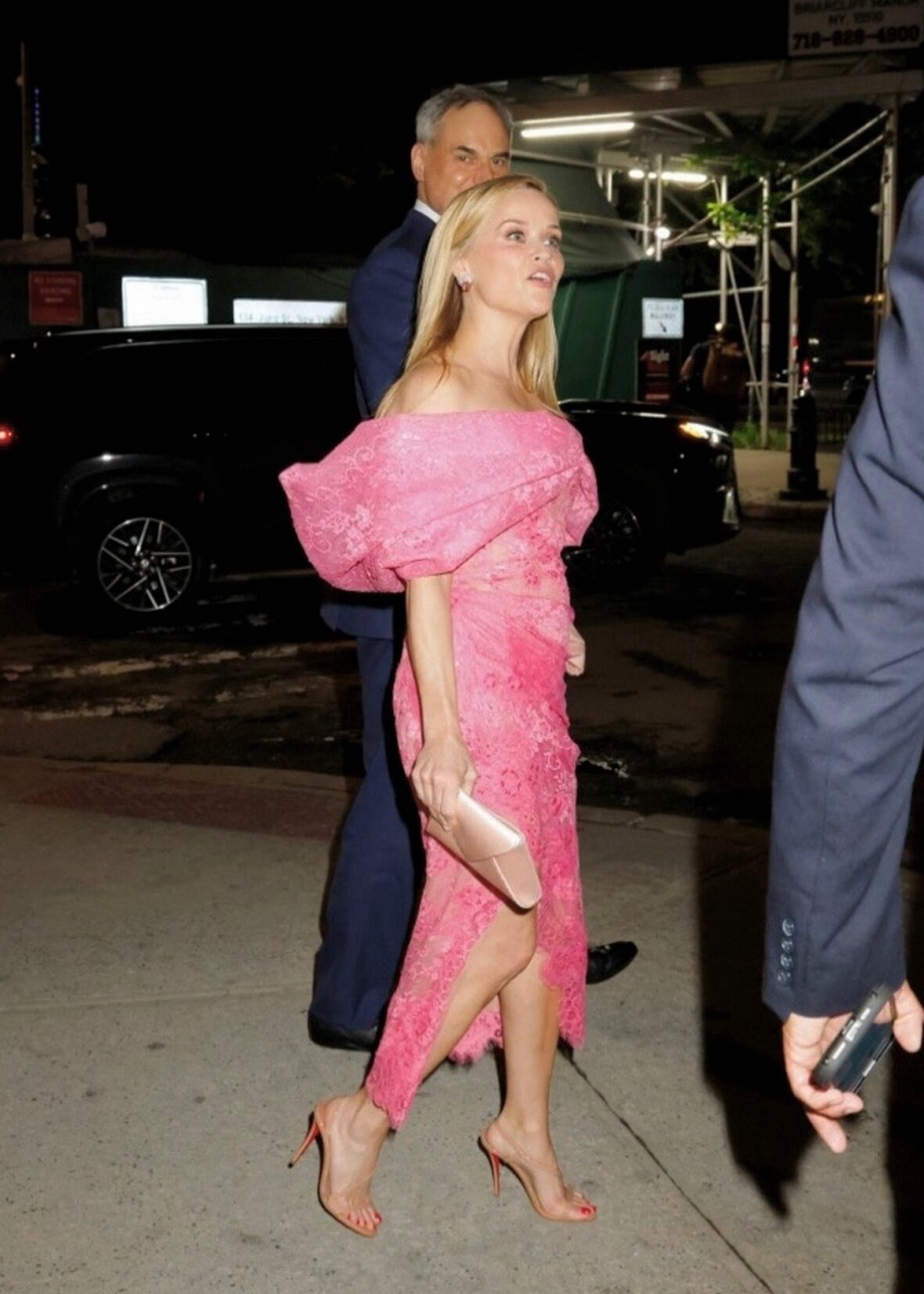 Reese Witherspoon holding hands with her boyfriend Oliver Haarmann