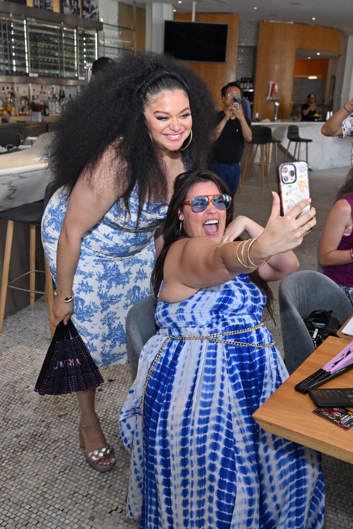 Michelle Buteau snaps selfie with a fan at NYC Pride drag brunch