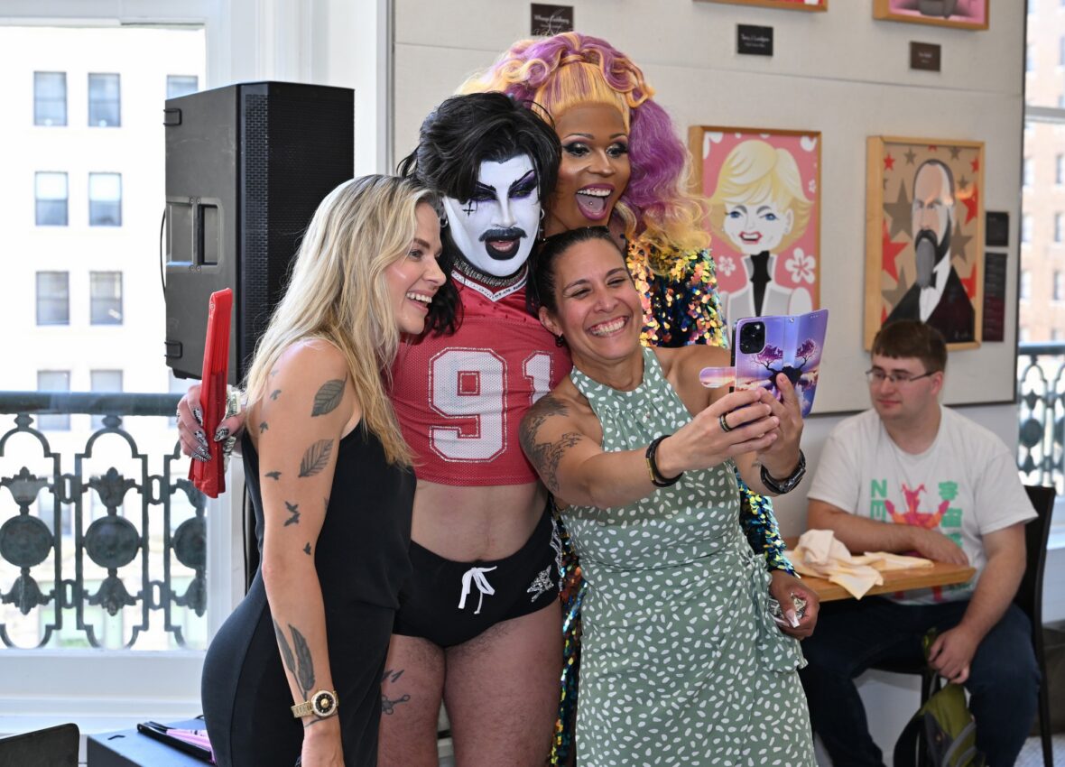 ShowPonii and Peppermint pose for a selfie with fans at NYC Pride drag brunch