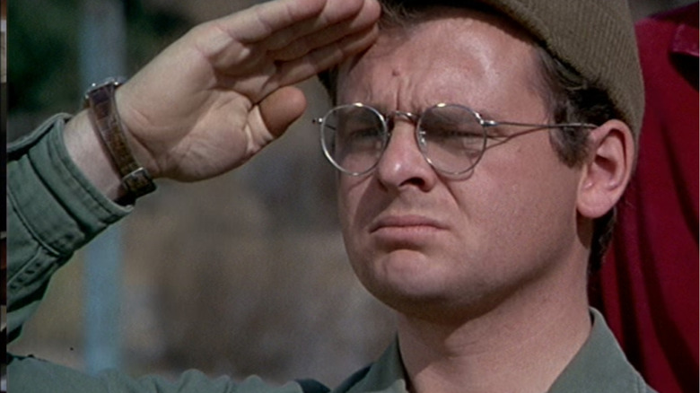Radar salutes as Colonel Henry Blake leaves the 4077th M*A*S*H