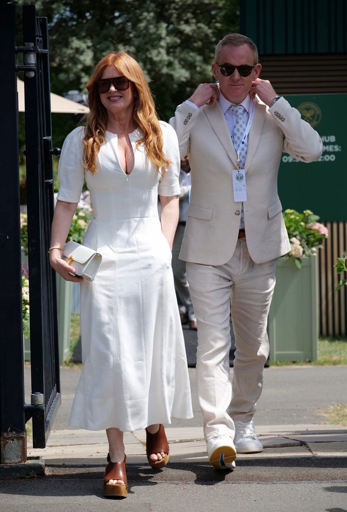 Isla Fisher and brother Daniel Fisher at Wimbledon 2026.