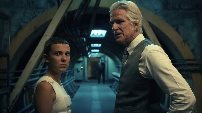 Eleven and Dr. Brenner in an underground base in Stranger Things (2016)