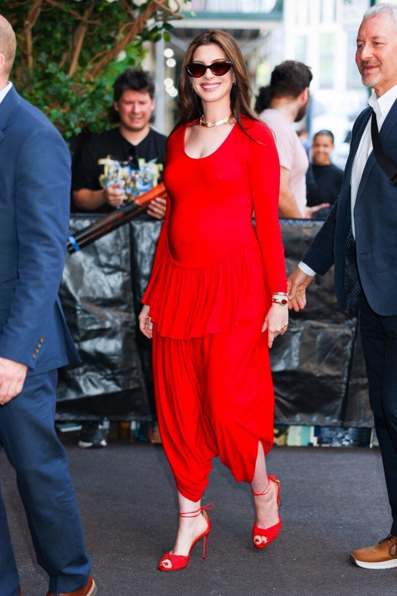Anne Hathaway steps out in red to promote new movie The Odyssey