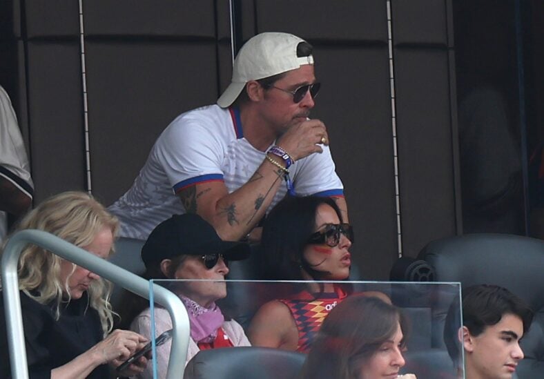 Brad Pitt and Ines De Ramon watch Spain vs. Belgium during the 2026 FIFA World Cup quarter final