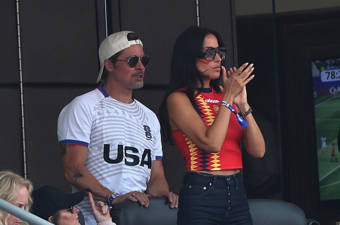 Brad Pitt and Ines De Ramon watch Spain vs. Belgium during the 2026 FIFA World Cup quarter final