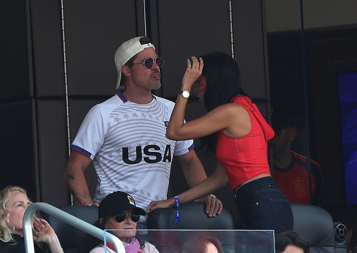 Brad Pitt and Ines De Ramon watch Spain vs. Belgium during the 2026 FIFA World Cup quarter final