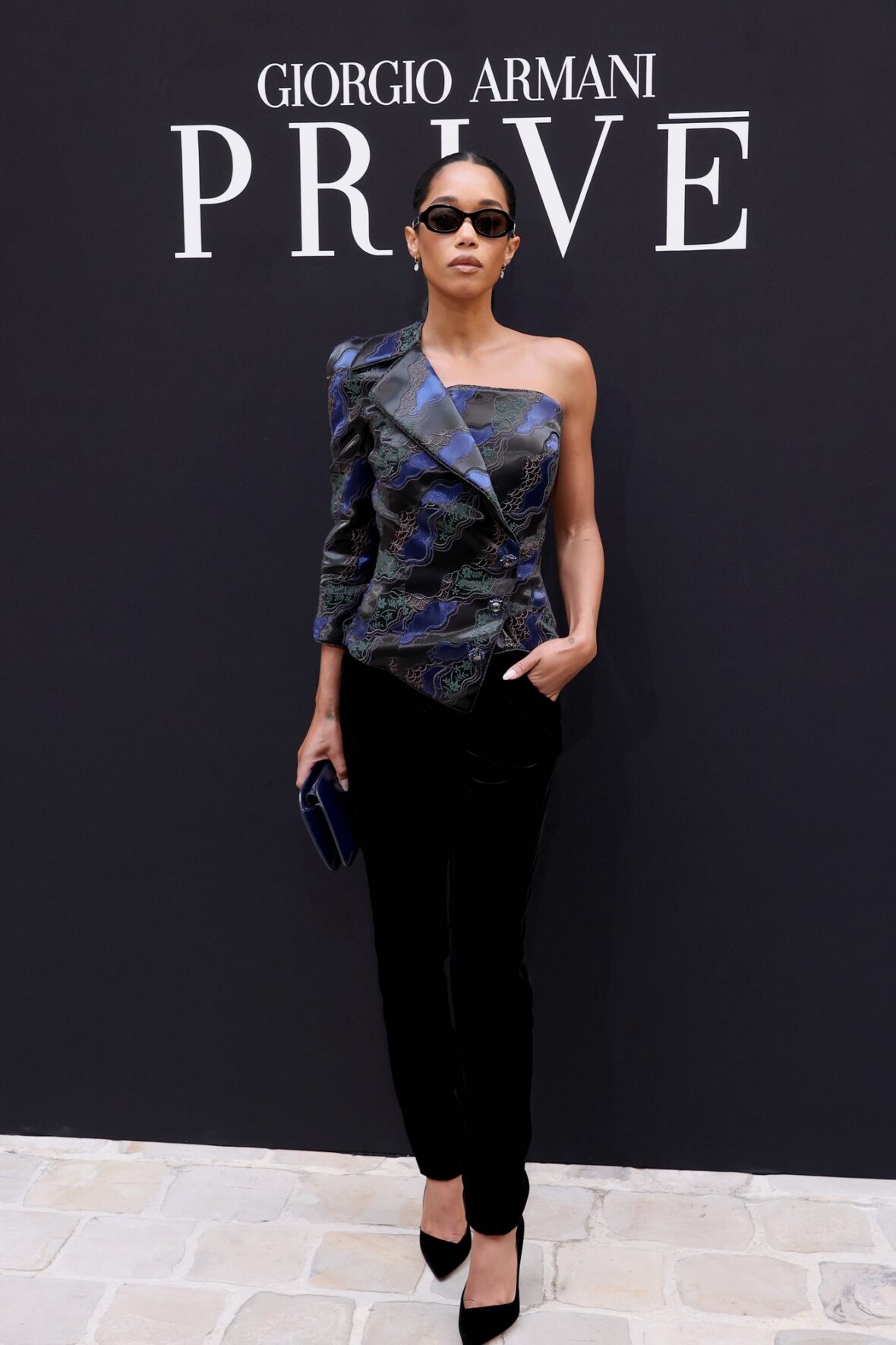 Laura Harrier attends Giorgio Armani Prive fashion show