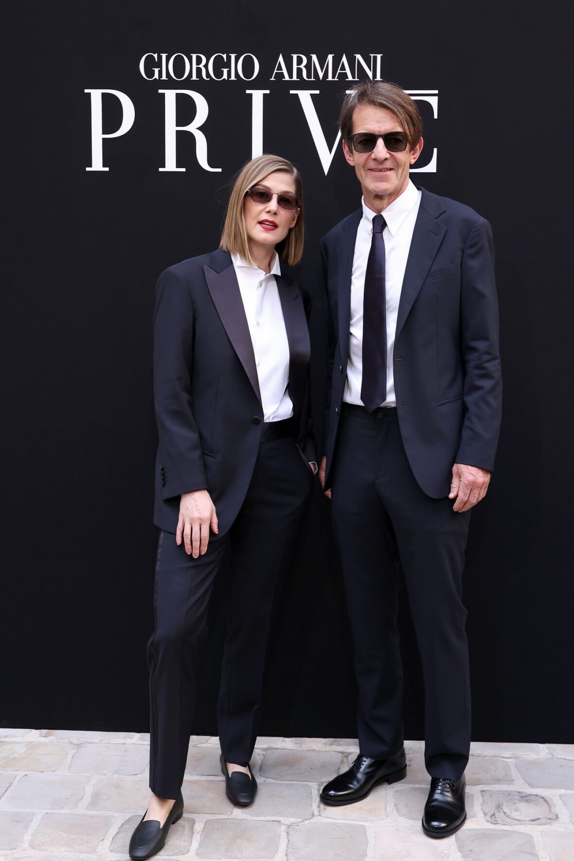 Rosamund Pike and Robie Uniacke attend Giorgio Armani Prive fashion show