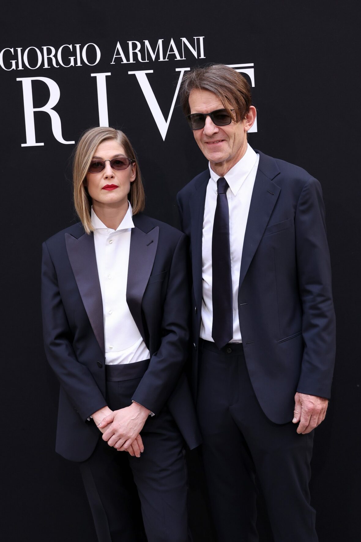 Rosamund Pike and Robie Uniacke attend Giorgio Armani Prive fashion show