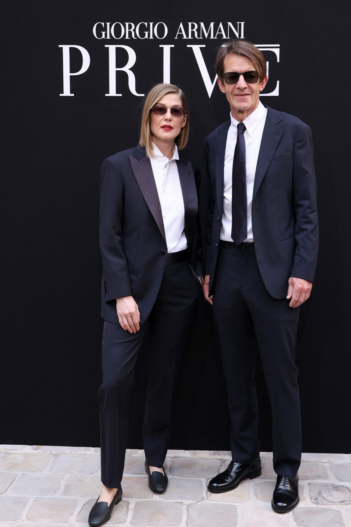 Rosamund Pike and Robie Uniacke attend Giorgio Armani Prive fashion show