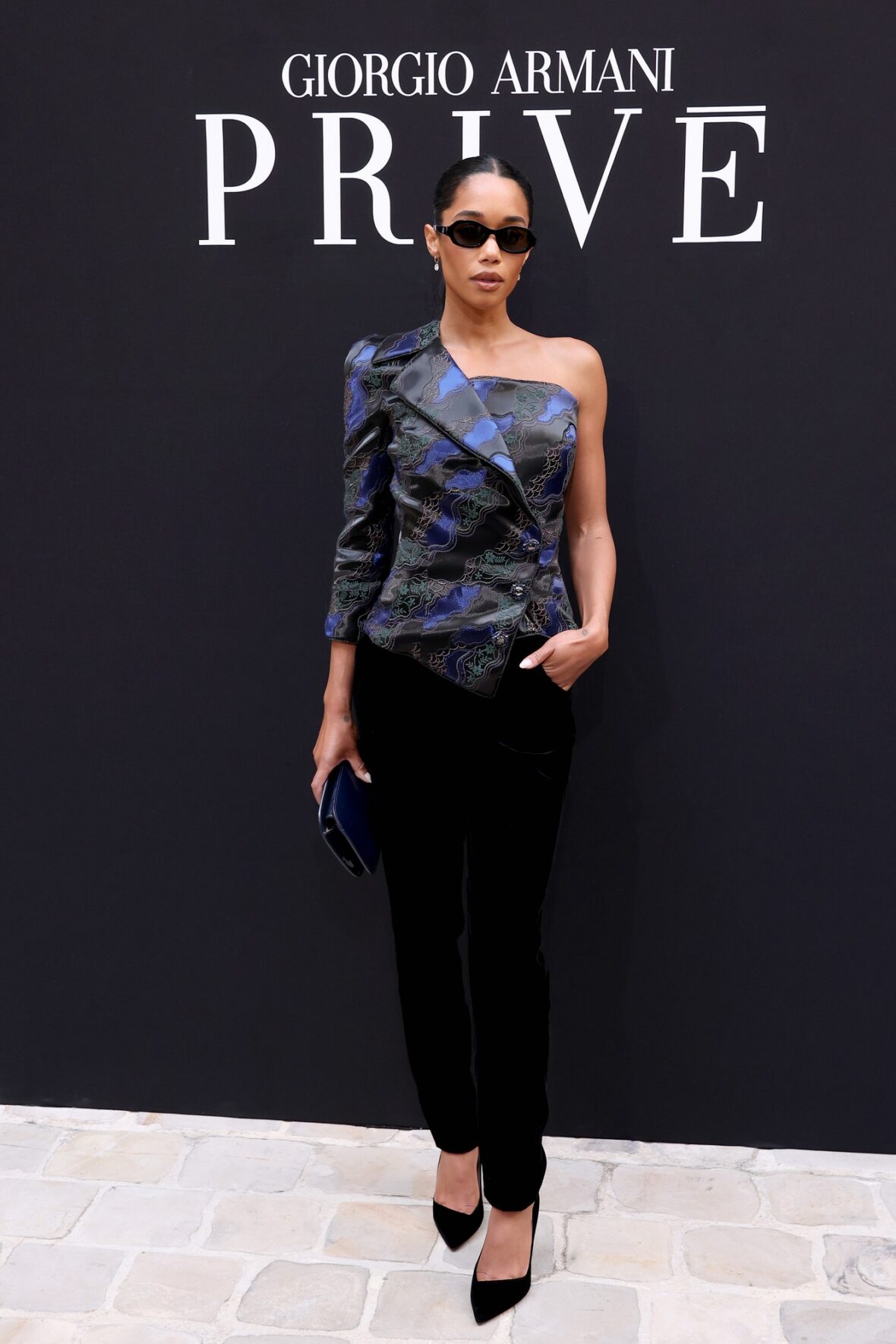 Laura Harrier attends Giorgio Armani Prive fashion show