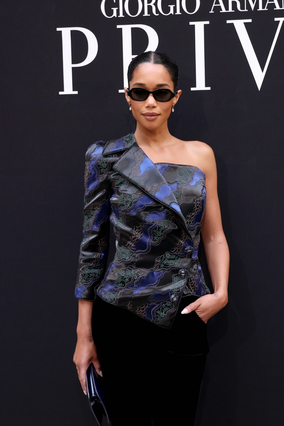 Laura Harrier attends Giorgio Armani Prive fashion show