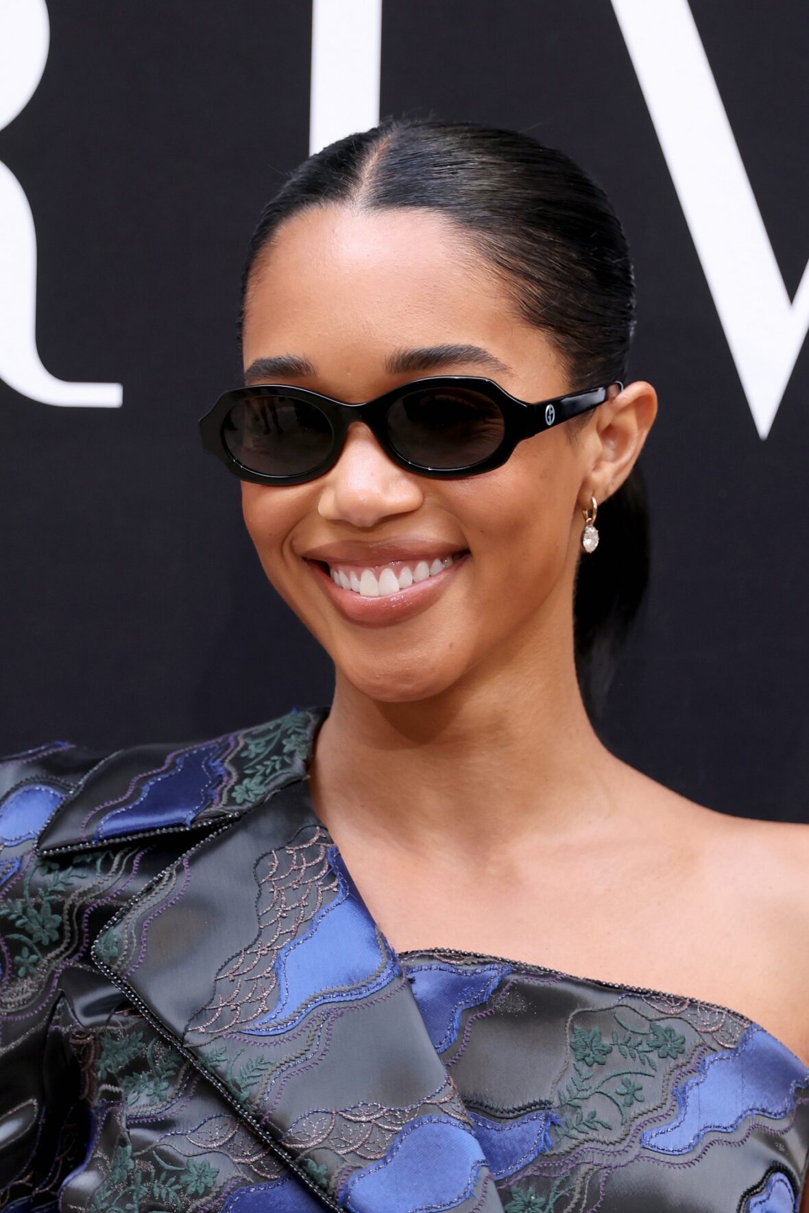 Laura Harrier attends Giorgio Armani Prive fashion show