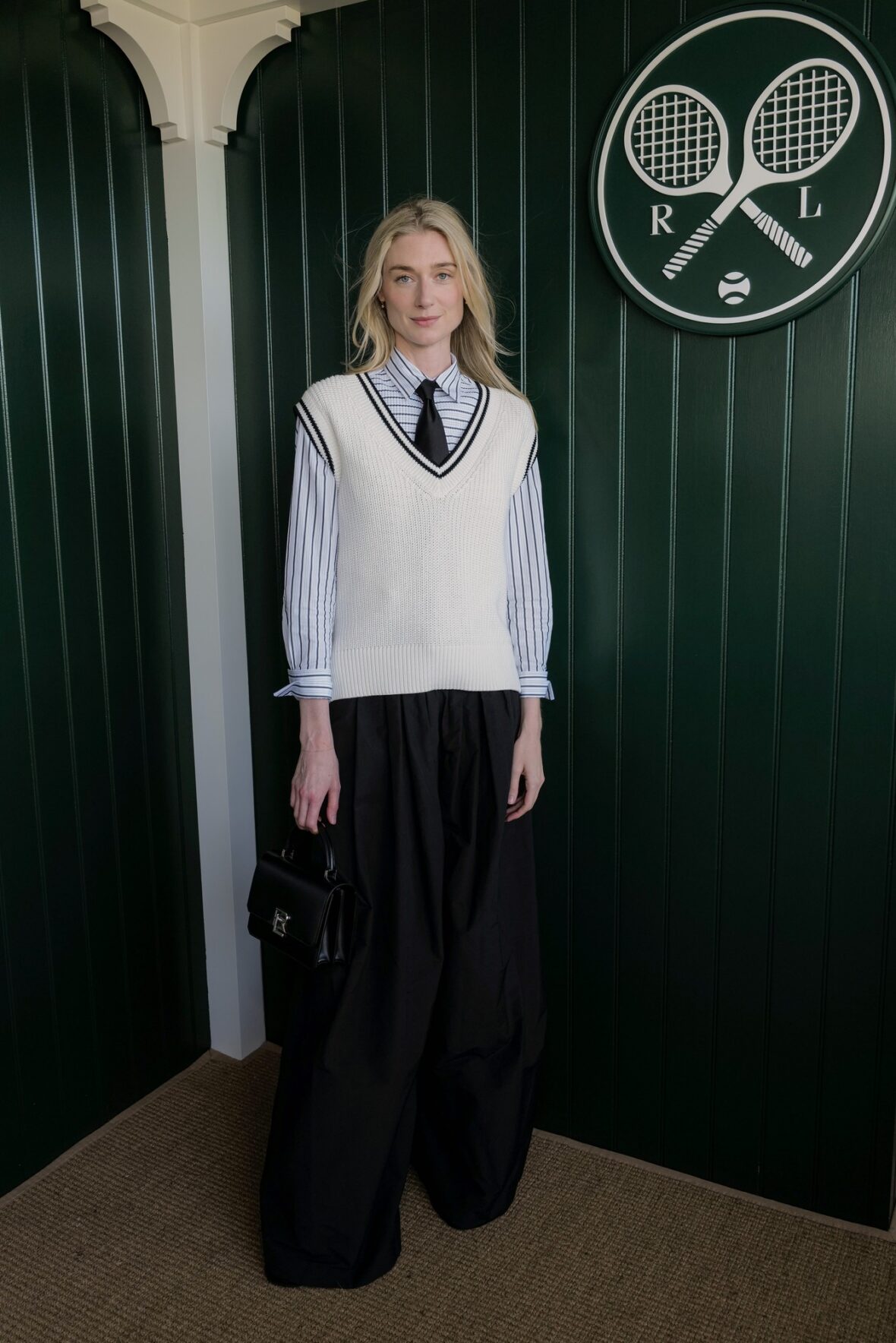Elizabeth Debicki visits The Polo Bar by Ralph Lauren at Centre Court at Wimbledon