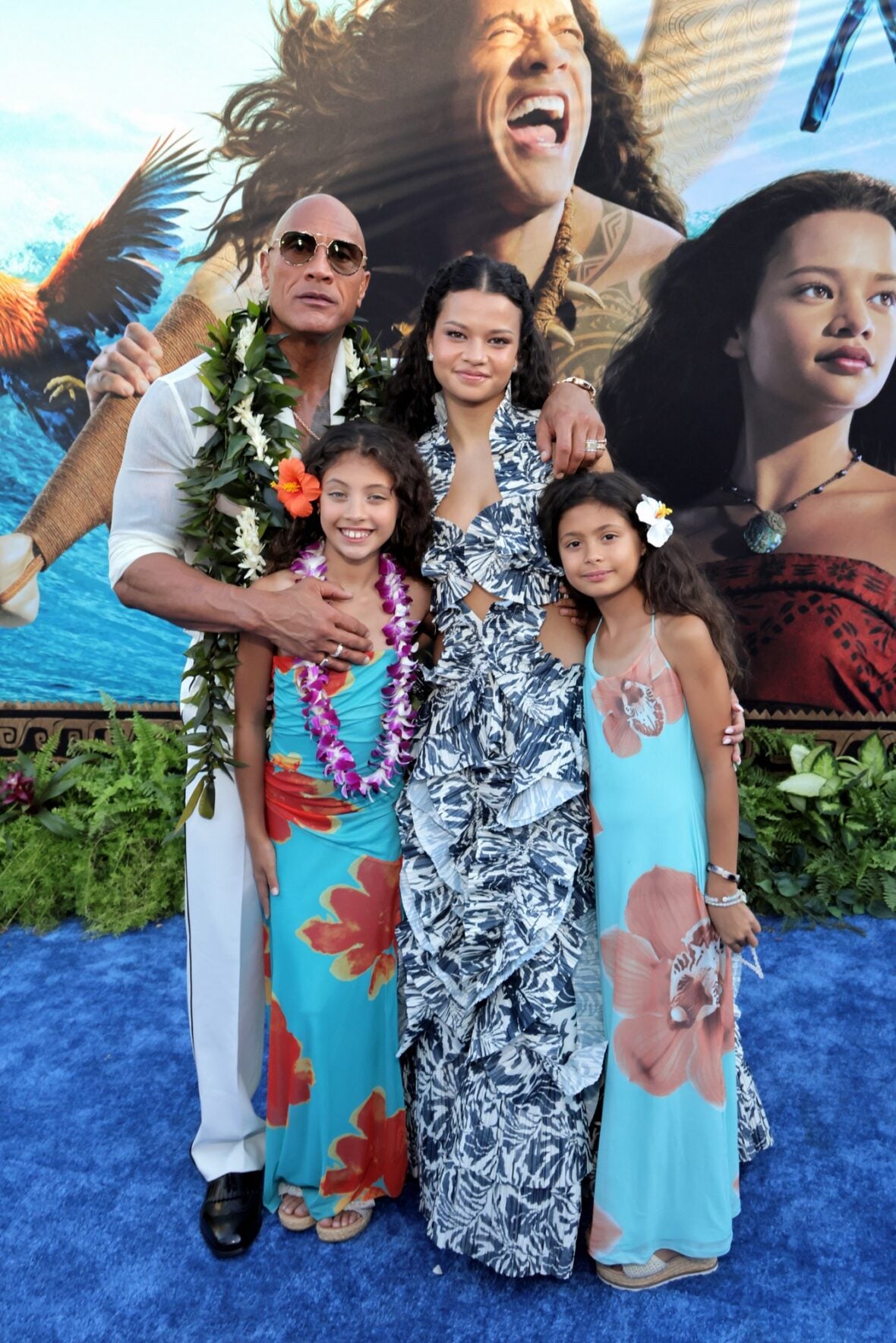 Dwayne Johnson, Catherine Laga'aia and his daughters at the live-action Moana premiere in Los Angeles