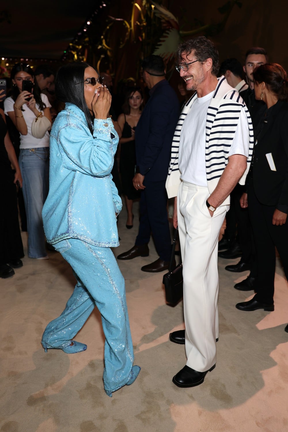 Guests at the Chanel fashion show on July 7, 2026