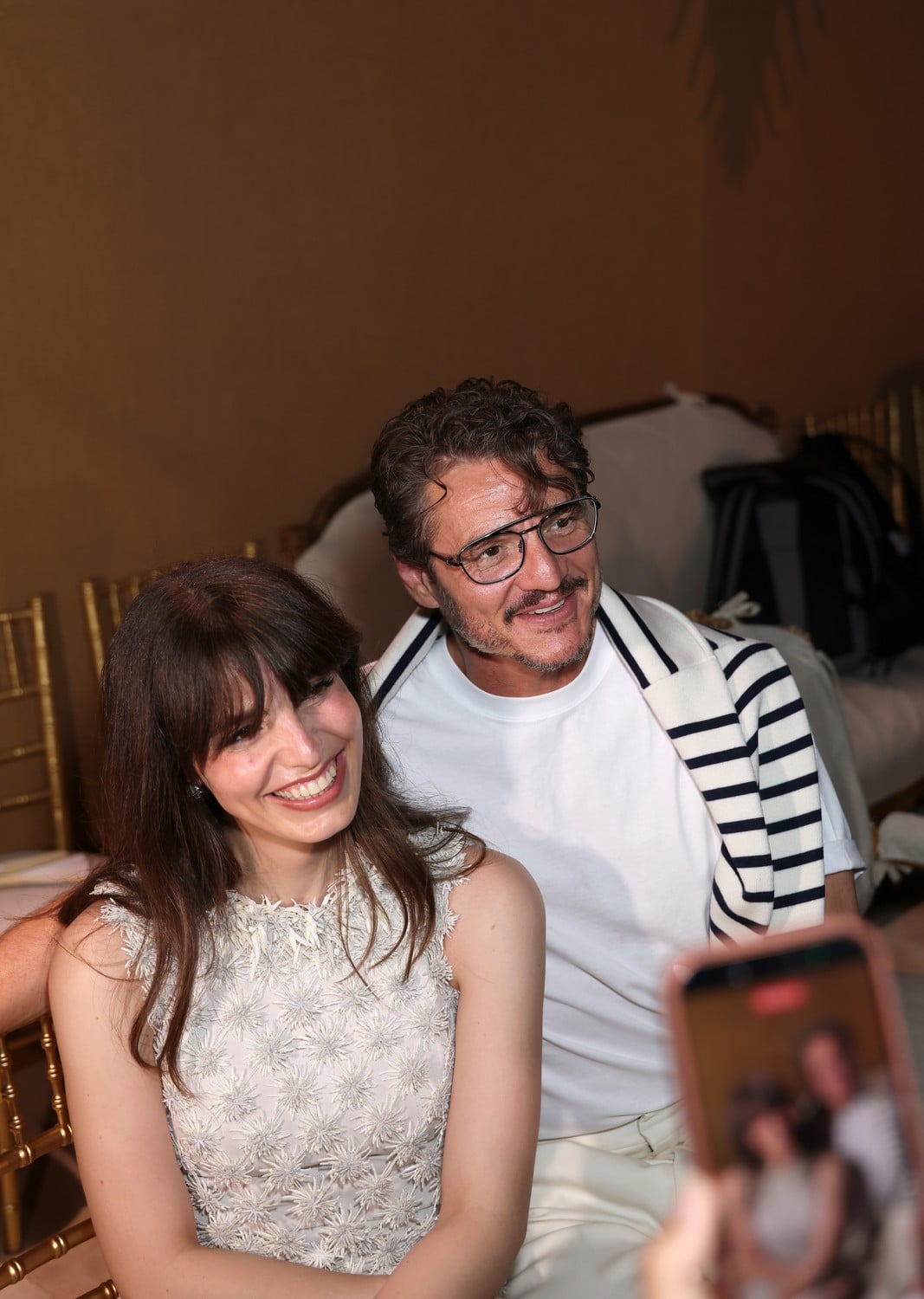 Guests at the Chanel fashion show on July 7, 2026