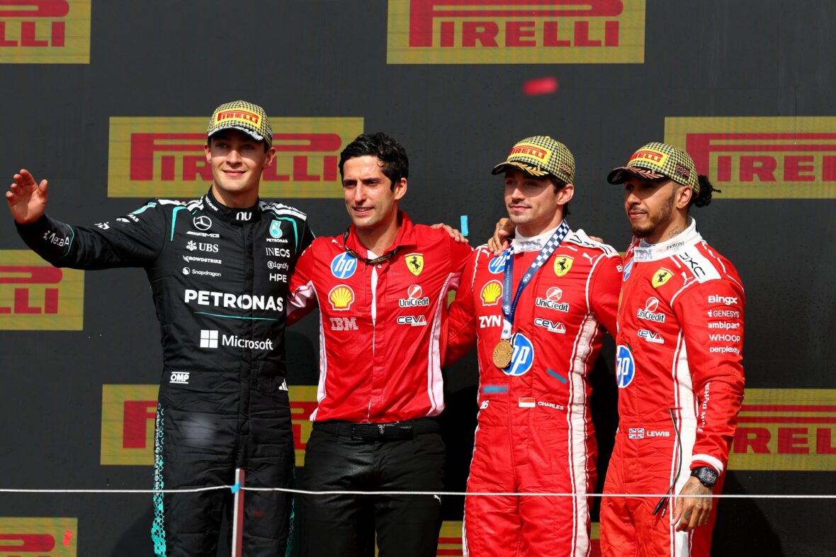 George Russell, Bryan Bozzi, Charles Leclerc and Lewis Hamilton on the podium after the British Grand Prix