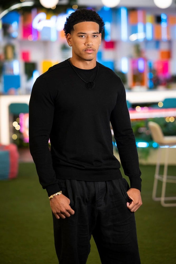 Corbin Mims poses inside the Love Island USA villa