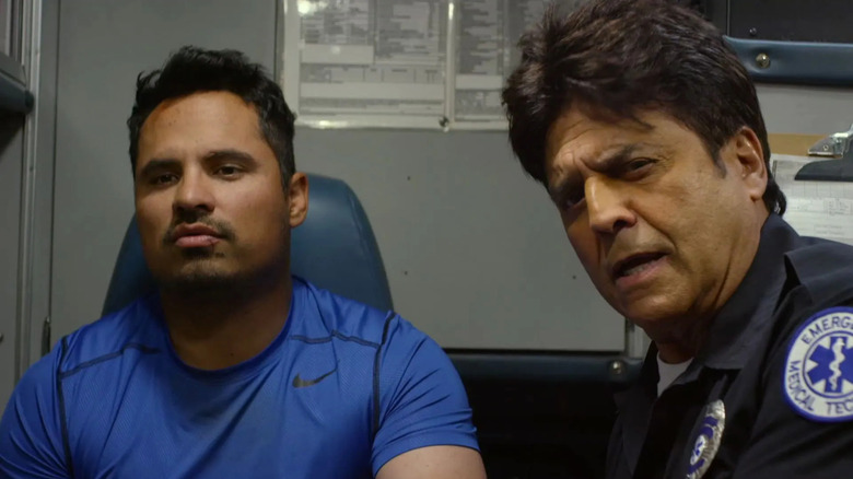 Ponch Poncherello and a paramedic in an ambulance in CHiPs (2017)