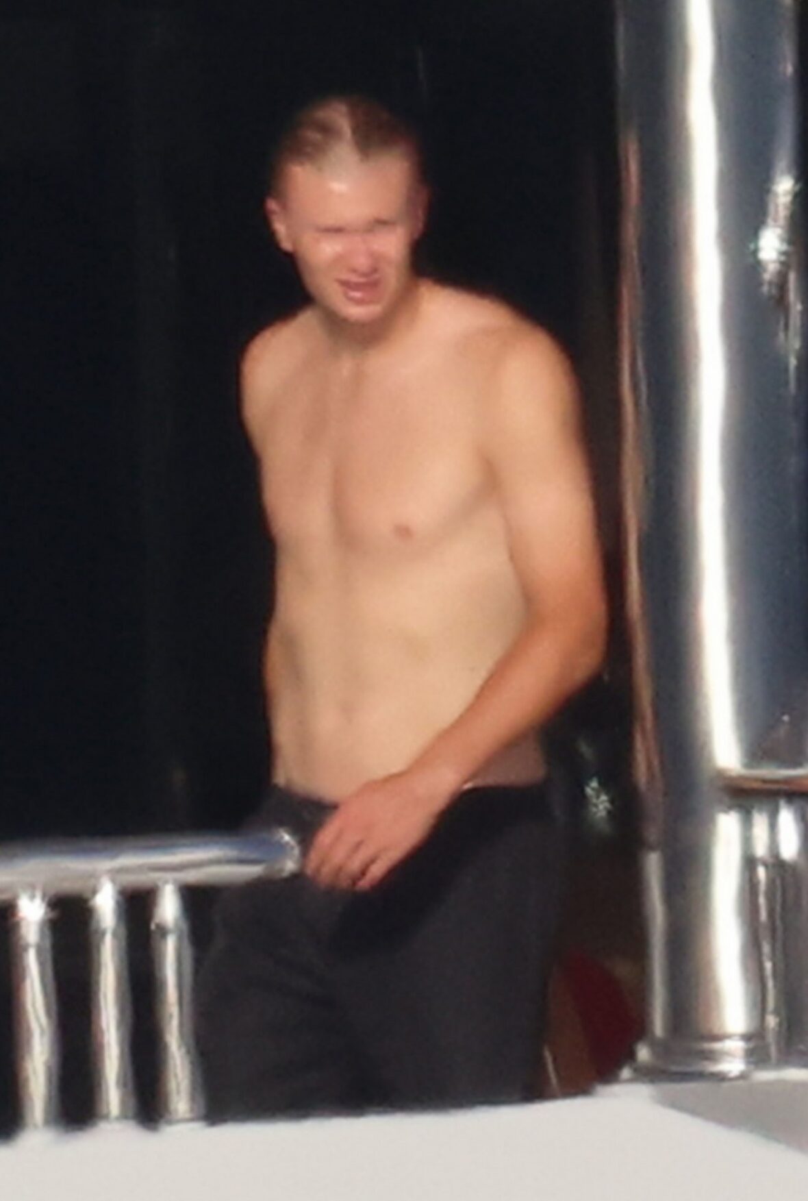 Erling Haaland shirtless on yacht
