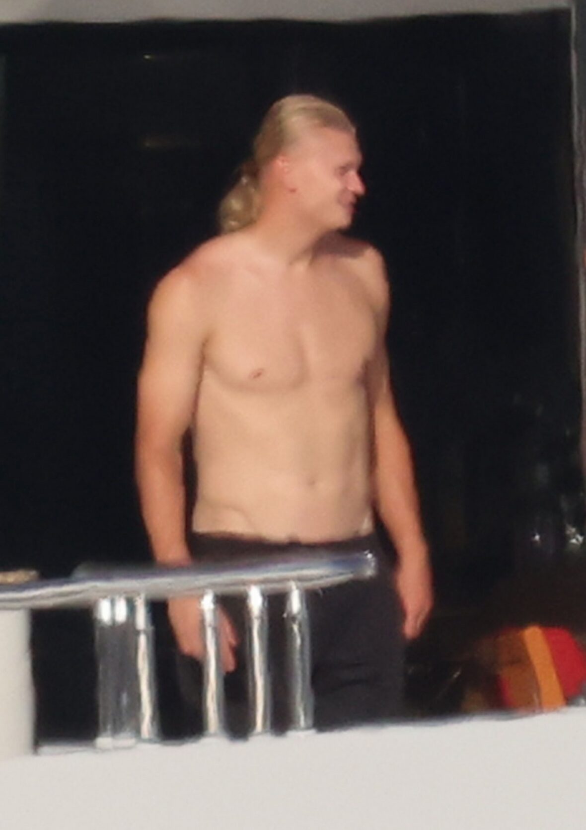 Erling Haaland shirtless on yacht