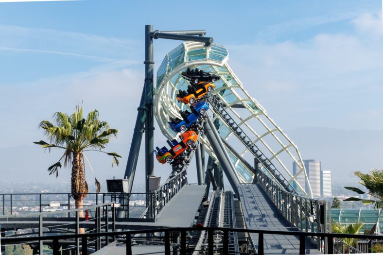 Photo of ride vehicles circulating empty on the Fast & Furious: Hollywood Drift coaster