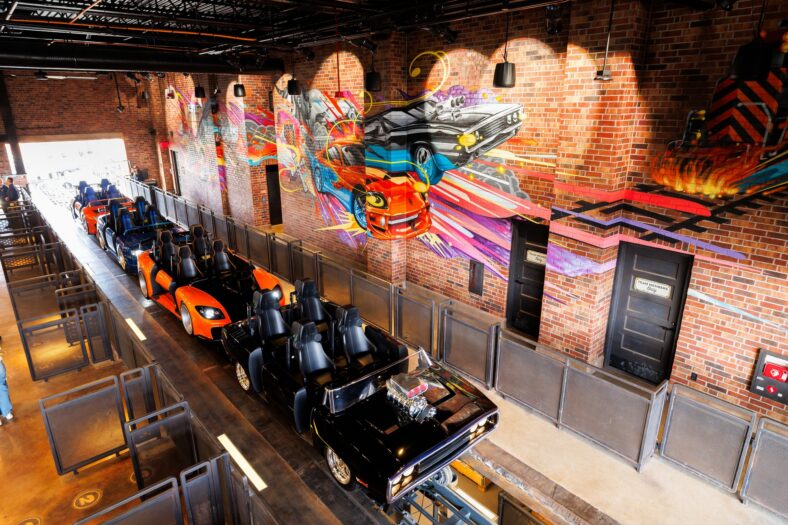Photo of the Fast & Furious: Hollywood Drift ride vehicles in the loading bay