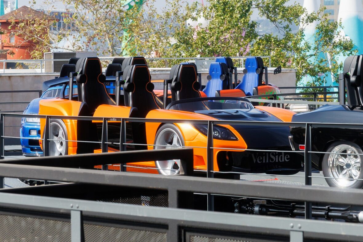 Photo of the Fast & Furious: Hollywood Drift ride vehicles on track