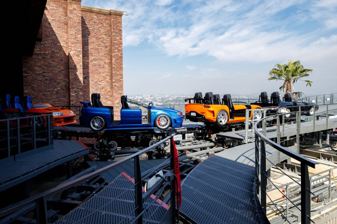 Photo of the Fast & Furious: Hollywood Drift ride vehicles on track