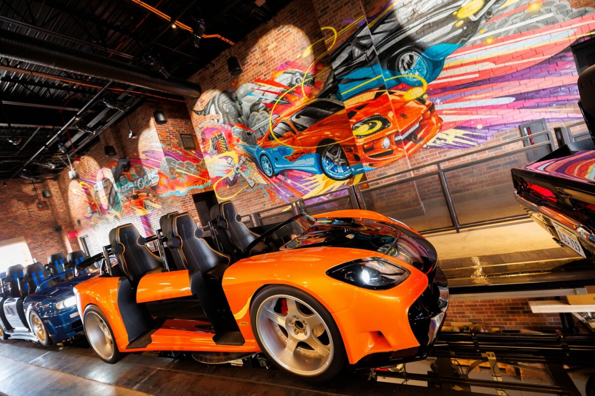 Photo of the Fast & Furious: Hollywood Drift ride vehicles in the loading bay