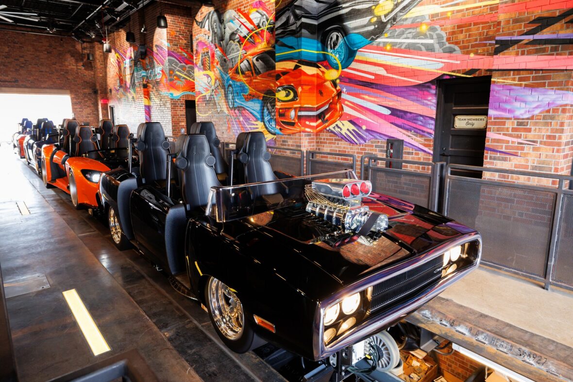 Photo of the Fast & Furious: Hollywood Drift ride vehicles in the loading bay