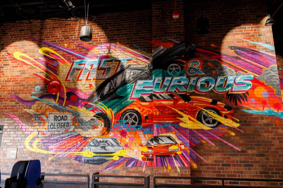 Photo of the Fast & Furious: Hollywood Drift mural in the loading bay