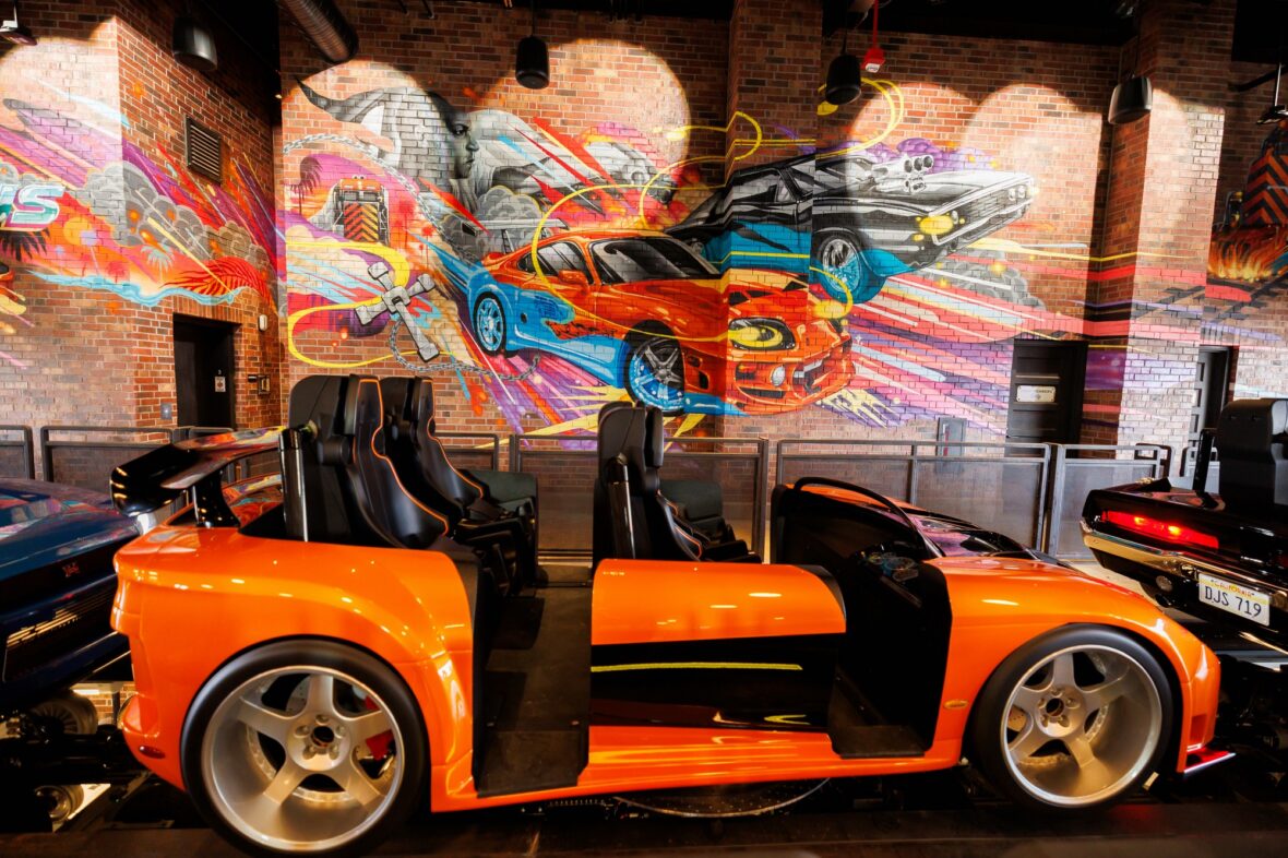 Photo of the Fast & Furious: Hollywood Drift ride vehicles in the loading bay