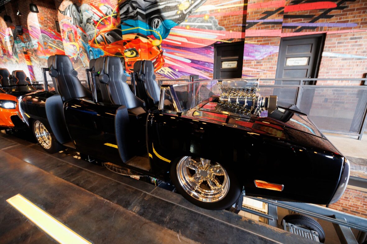 Photo of the Fast & Furious: Hollywood Drift ride vehicles in the loading bay