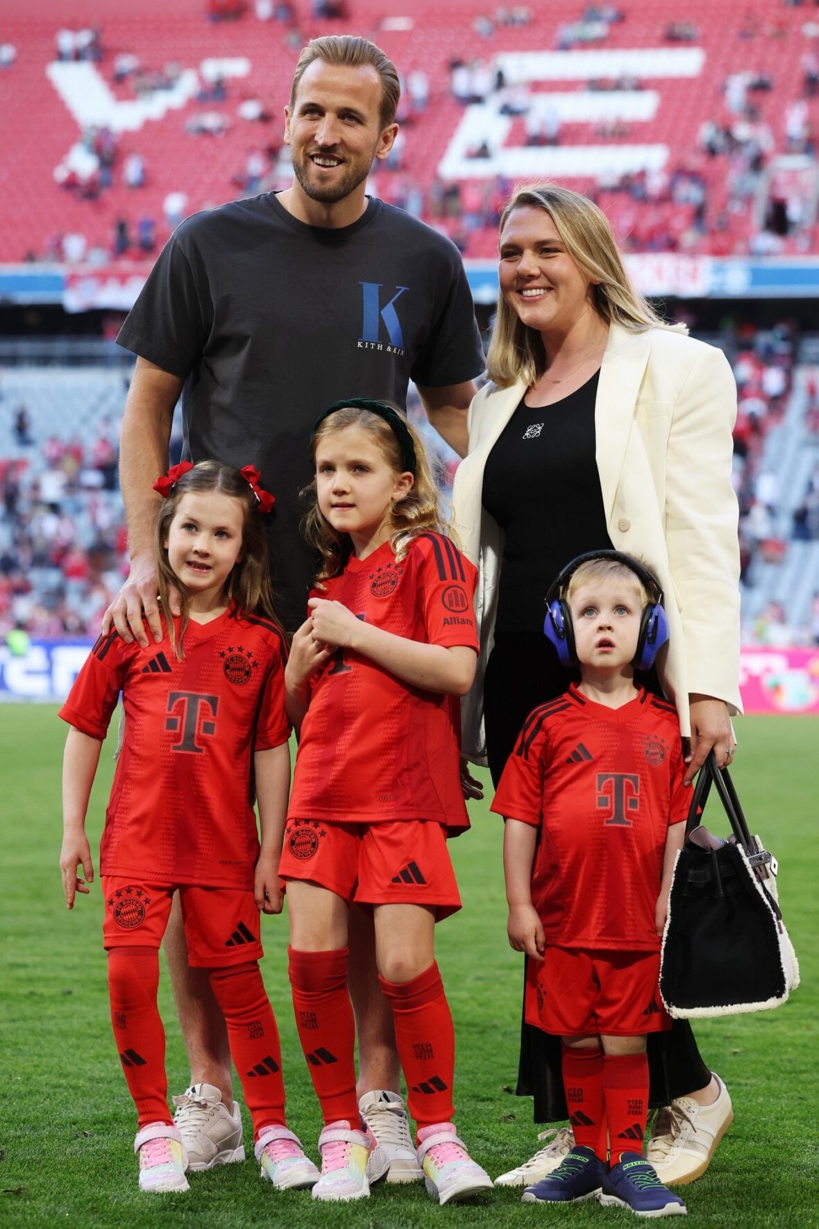 Harry and Kate Kane with their kids at a Bundesliga match