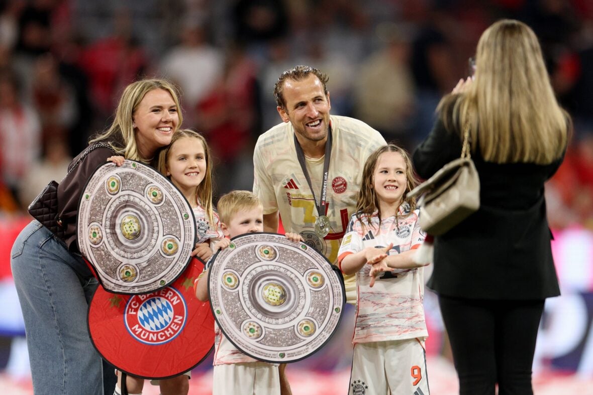 Harry and Katie Kane with their kids at the Bundesliga match