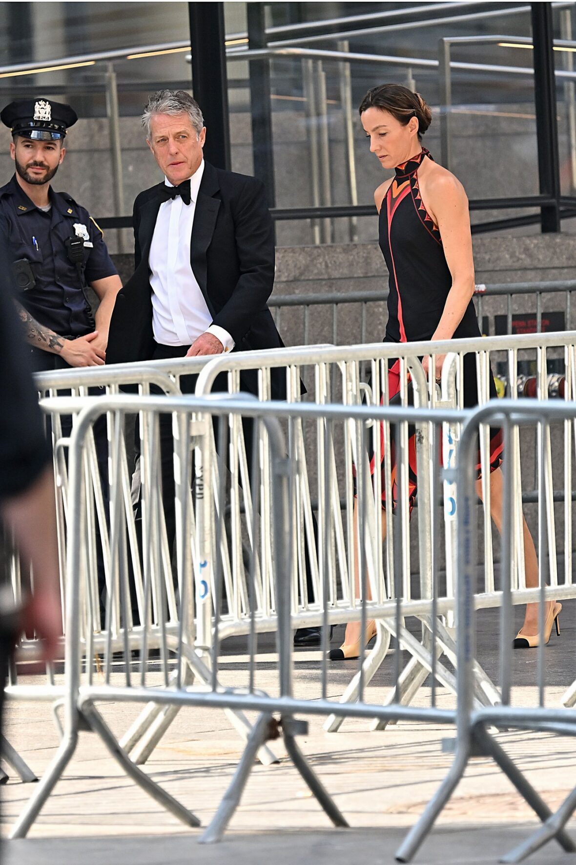 Hugh Grant and wife Anna Eberstein arrive at Madison Square Garden