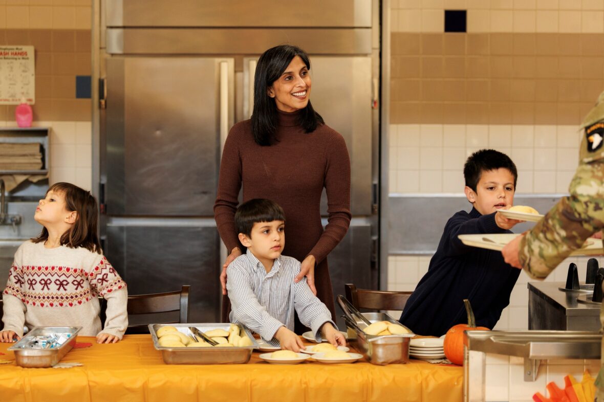 Usha Vance with three of her four kids serve members of the 101st Airborne Division for Thanksgiving