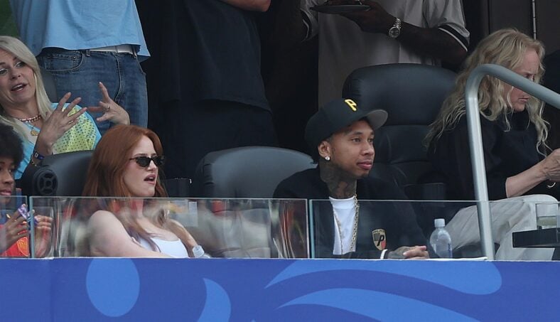Madelaine Petsch and Tyga in the stands during 2026 FIFA World Cup quarter finals