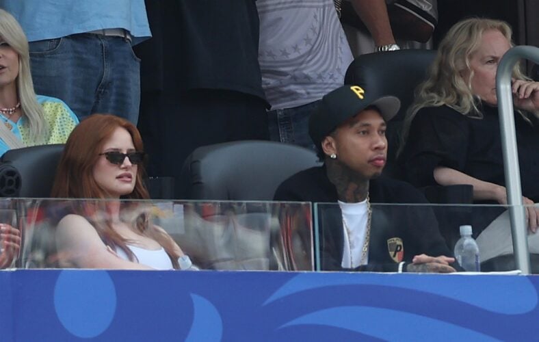 Madelaine Petsch and Tyga in the stands during 2026 FIFA World Cup quarter finals