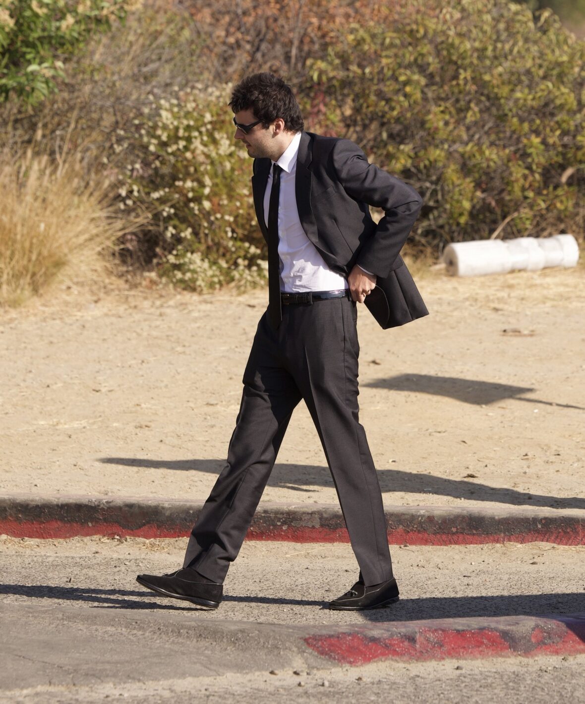 A guest arrives for Matty Healy and Gabriette's wedding in Los Angeles