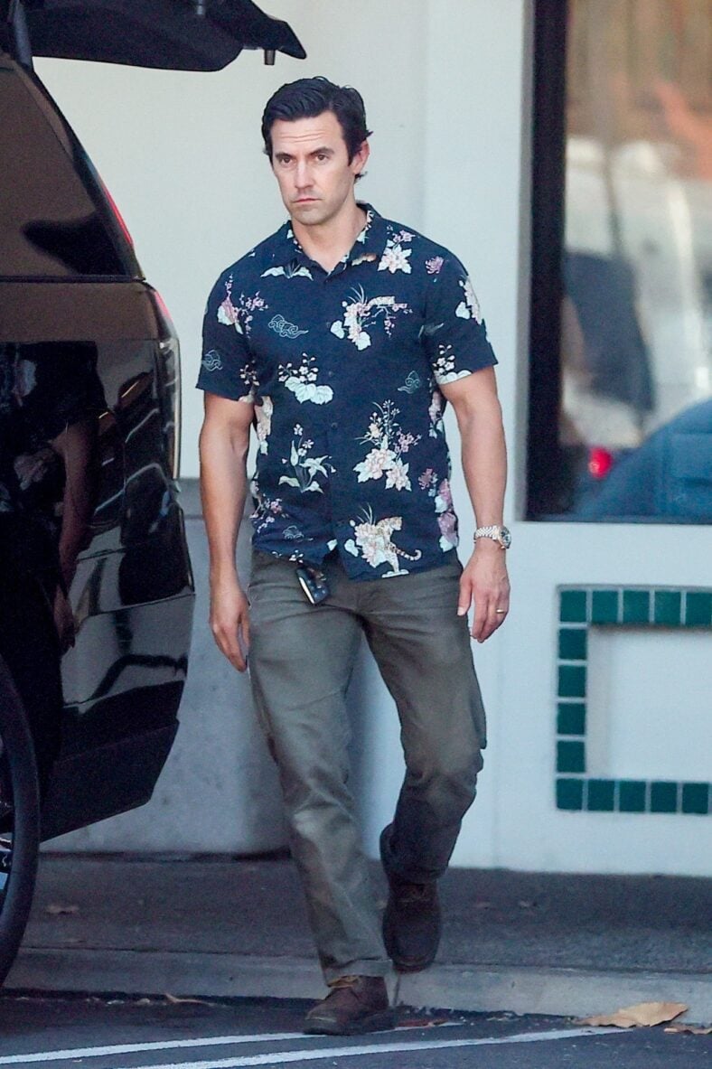 Milo Ventimiglia in a floral print shirt.