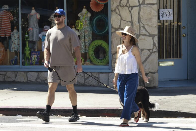 Minka Kelly and Dan Reynolds walking their dog
