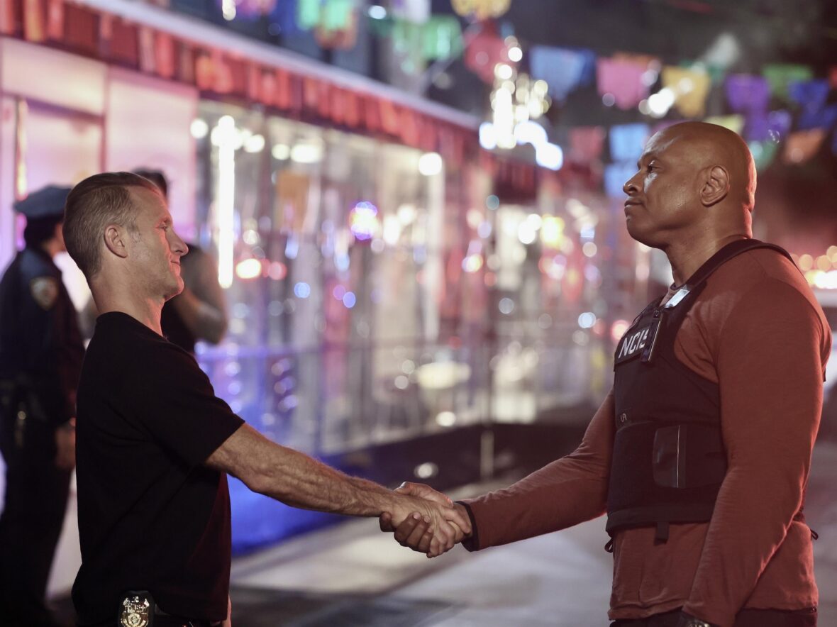 Scott Caan and LL Cool J shake hands in 'NCIS: New York' on set filming photo