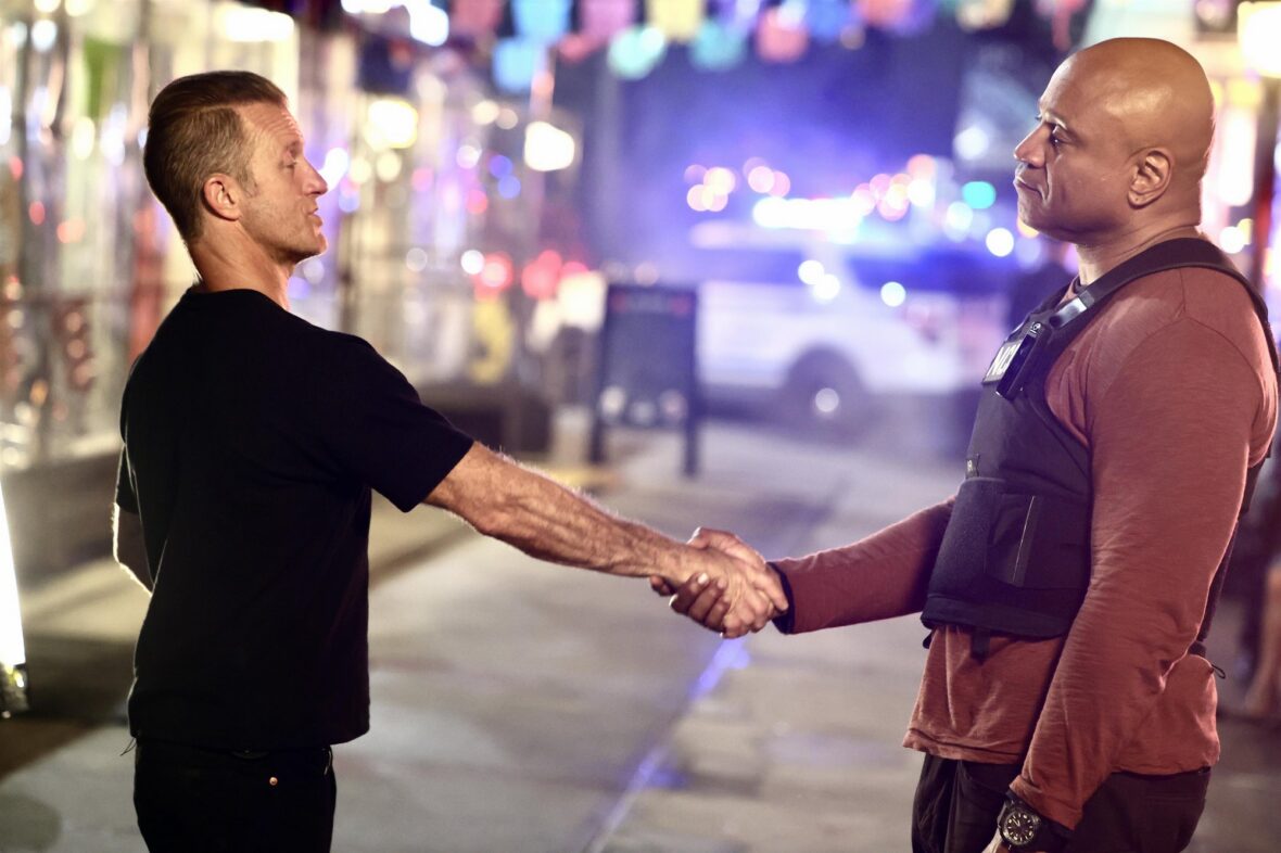 Scott Caan and LL Cool J shake hands in 'NCIS: New York' on set filming photo